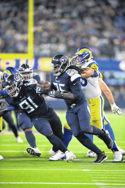 Murchison 'grateful' for 2-sack Rams debut after Titans exit